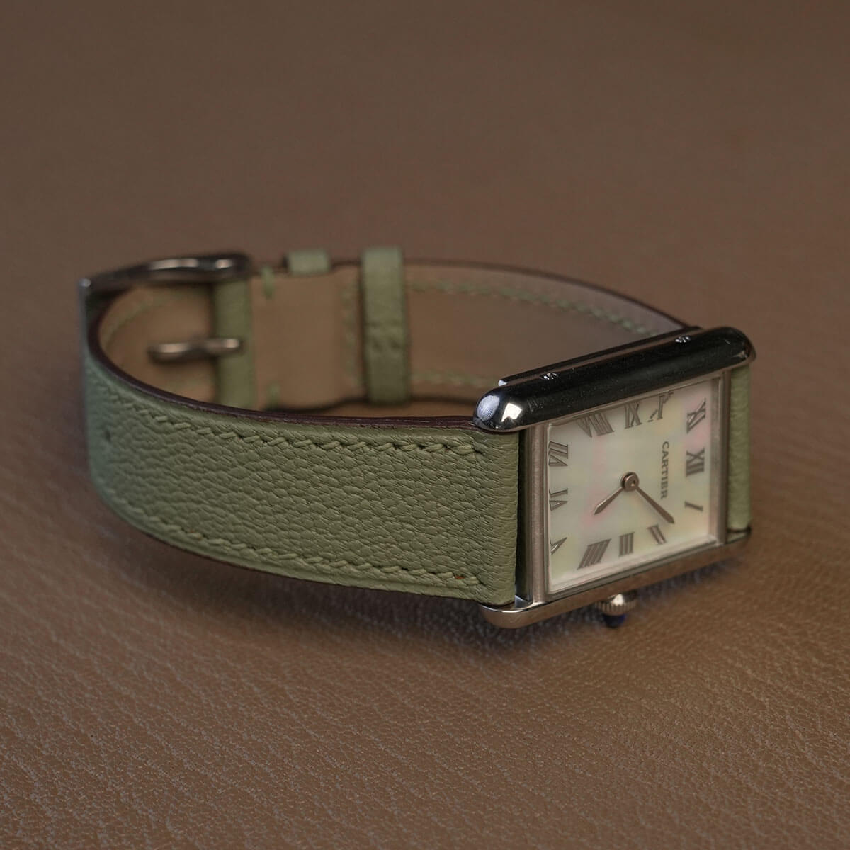 Avocado green French Alran goat leather watch strap showing comfortable Haas Zermatt inner lining