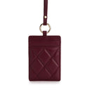 Burgundy quilted leather ID card holder with gold ring and strap, luxury accessory