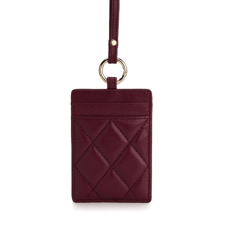 Burgundy quilted leather ID card holder with gold ring and strap, luxury accessory