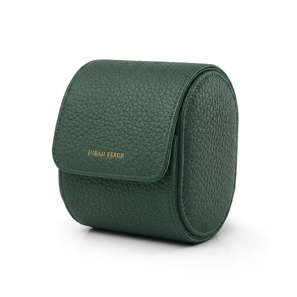 Green pebble leather wach storage box with 'Hiram Beran' branding on a white background