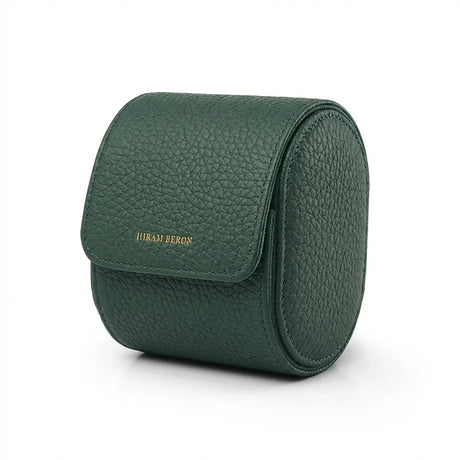 Green pebble leather wach storage box with 'Hiram Beran' branding on a white background