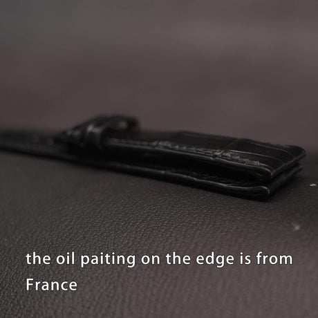 Side view showing smooth hand-painted edge burnishing and clean structural profile of the custom luxury alligator watch strap.