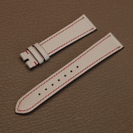 Pair of 1.8mm flat Beige White Alran chèvre leather watch bands showing red perimeter stitch detail