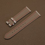 Light grey French Haas Zermatt waterproof lining with red underside stitching on custom watch stra