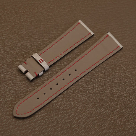 Light grey French Haas Zermatt waterproof lining with red underside stitching on custom watch stra