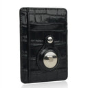 Black crocodile leather card holder with MagSafe attachment, luxury minimalist wallet design