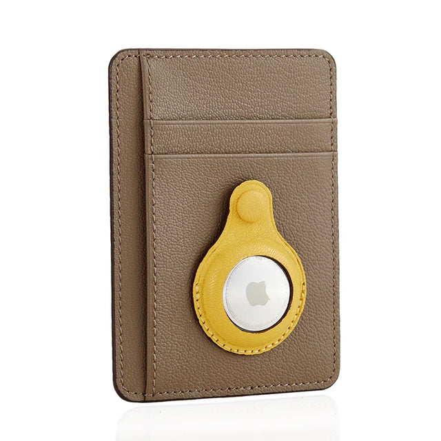 Tan leather cardholder with yellow AirTag holder, sleek minimalist design for everyday carry