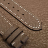 Close-up texture of French Epsom grain calfskin watch strap showing precision edge finishing