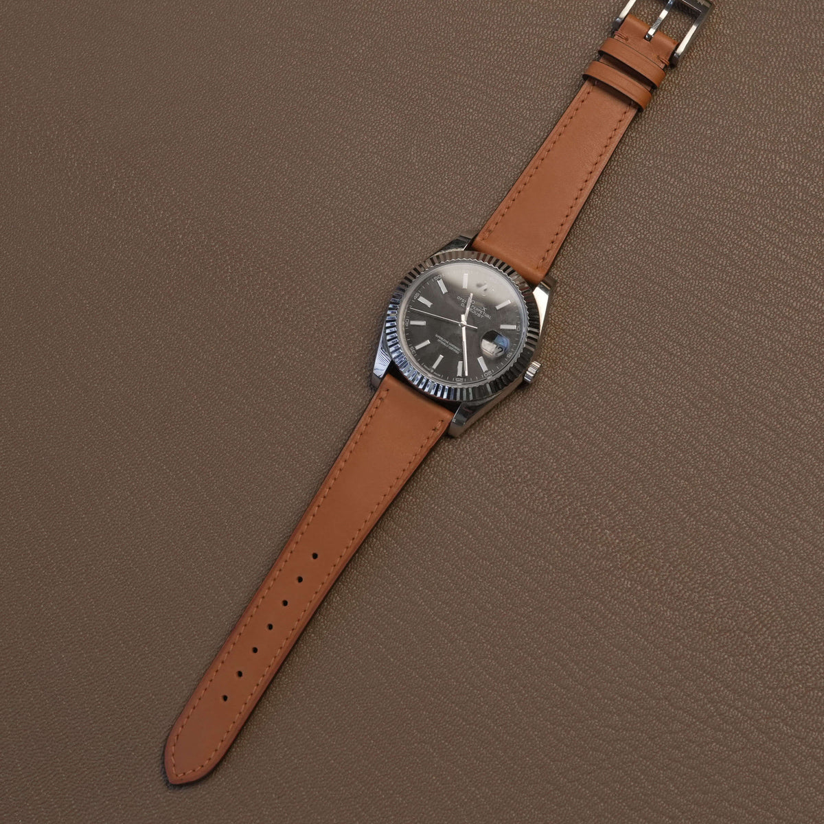 Italian light brown calfskin watch band fitted on luxury stainless steel dress watch 20mm lug size demonstration