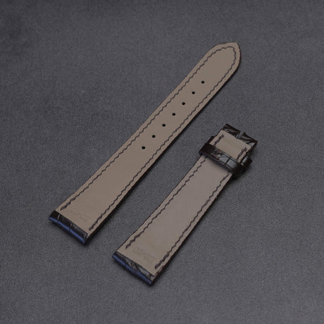  Soft waterproof leather lining and delicate hot-stamped logo detail on the backside of a bespoke black crocodile watch strap.