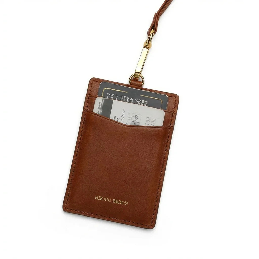 Brown Leather ID badge holder with a lanyard on a white background