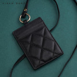 Black quilted leather ID holder with gold ring and lanyard, luxury card case