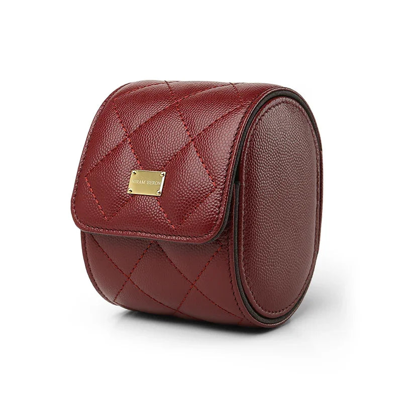 red leather watch roll with gold plate brand name "HIRAM BERON" on it