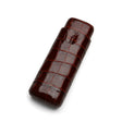 Luxury crocodile-embossed leather cigar case, rich brown, premium texture, elegant design for travel or gifting