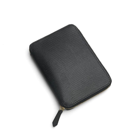 Black lizard pattern leather passport wallet  on a white background
