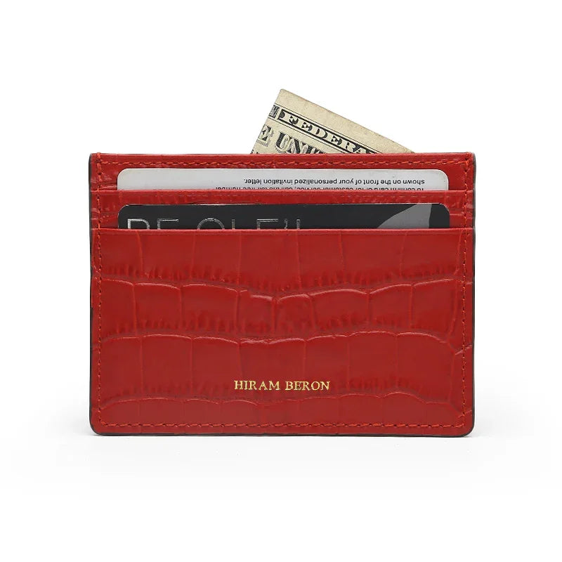 Red cardholder with card slots and a bill pocket on a white background