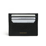 Black python skin cardholder with 'Hiram Beron' branding on a white background