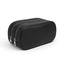 Black leather toiletry bag with zippers on a white background