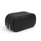 Black leather toiletry bag with zippers on a white background