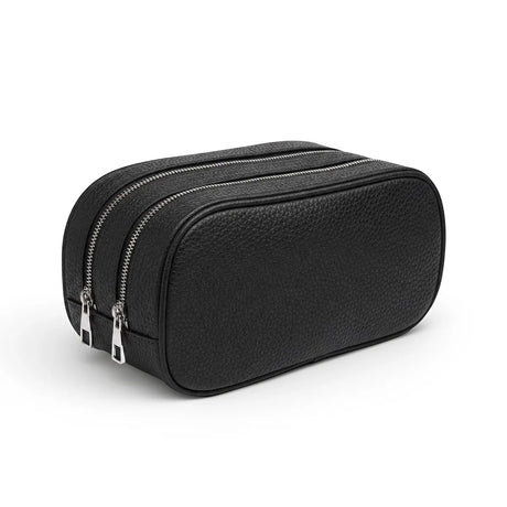 Black leather toiletry bag with zippers on a white background