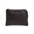Black leather aligator pattern coin pouch with gold zipper on a white background