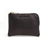 Black leather aligator pattern coin pouch with gold zipper on a white background