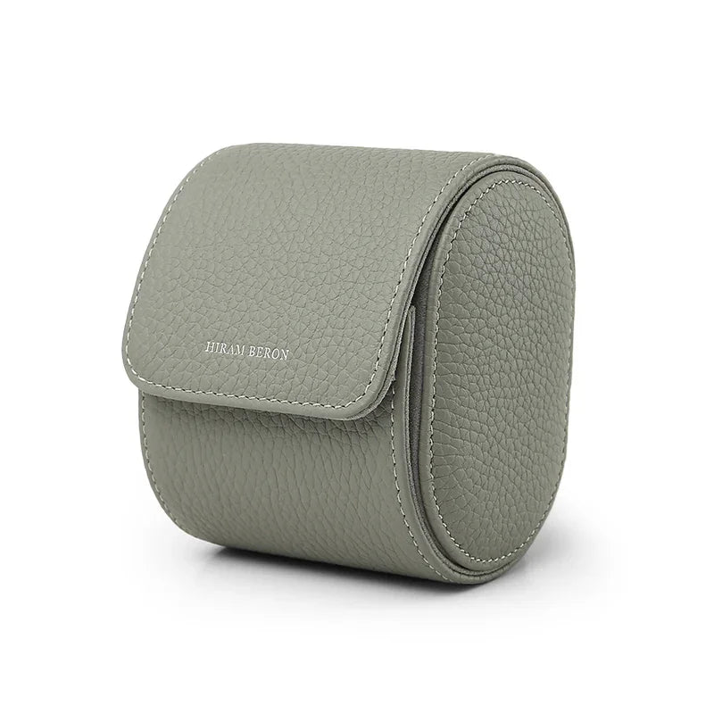 Light grey pebble leather watch storage case with 'Hiram Beron' branding on a white background