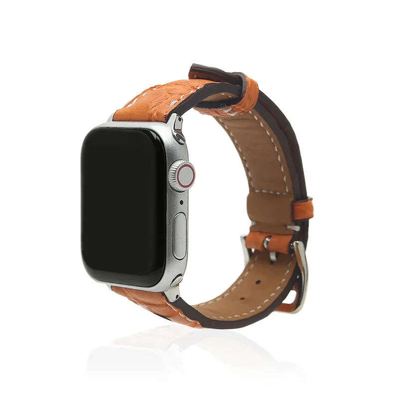 Smartwatch with a orange leather strap on a white background