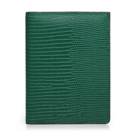 Green textured leather wallet on a white background