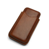 Brown leather phone sleeve with hand-stitched edges, premium minimalist design for iPhone protection