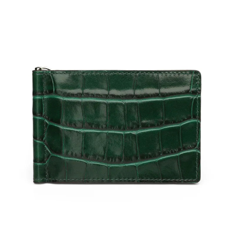 Green crocodile-patterned money clip wallet on a white background