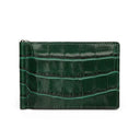 Green crocodile-patterned money clip wallet on a white background