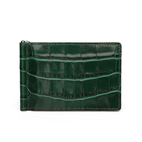 Green crocodile-patterned money clip wallet on a white background