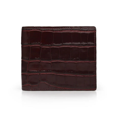 Brown crocodile-patterned wallet on a white background