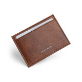 Brown leather cardholder with 'Hiram Beron' branding on a white background