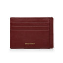 Burgundy leather cardholder with 'Hiram Beron' branding on a white background