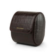 Brown aligator pattern leather watch roll with 'Hiram Beran' branding on a white background