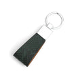 Keychain with dark green python skin leather strap on a white background