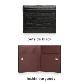 Black aligator-patterned wallet on top, open burgundy wallet with gold buttons on bottom, labeled 'outside black' and 'inside burgundy'.