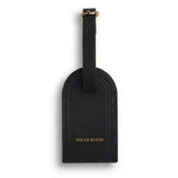 Black leather luggage tag with 'Hiram Beron' branding on a white background