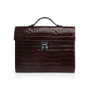 Burgundy crocodile-patterned leather business folios on a white background