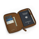 Brown leather passport wallet with a passport, card, and money on a white background