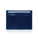 Navy blue lizard pattern leather cardholder on a white background