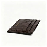 Brown crocodile-patterned wallet on a white background