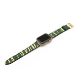 Smartwatch with a green and gold lizard skin watch band on a white background