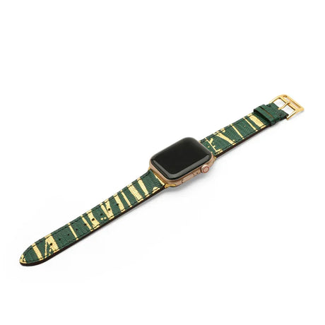 Smartwatch with a green and gold lizard skin watch band on a white background