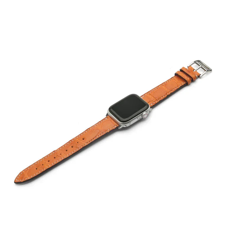 Smartwatch with a orange leather strap on a white background