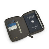 grey passport wallet with compartments for a passport, card, and phone on a white background