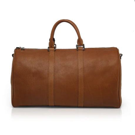 Brown vegetable tanned leather duffel bag on a white background