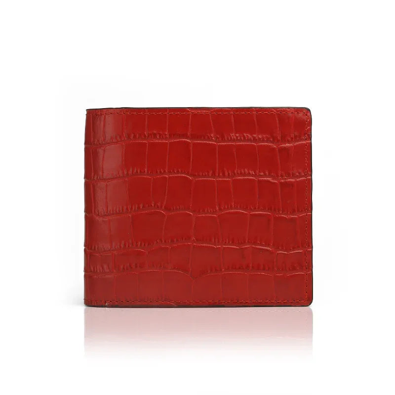 Red aligator-patterned wallet on a white background